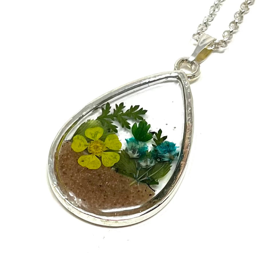 Teardrop Shaped Necklace featuring pressed wild flowers