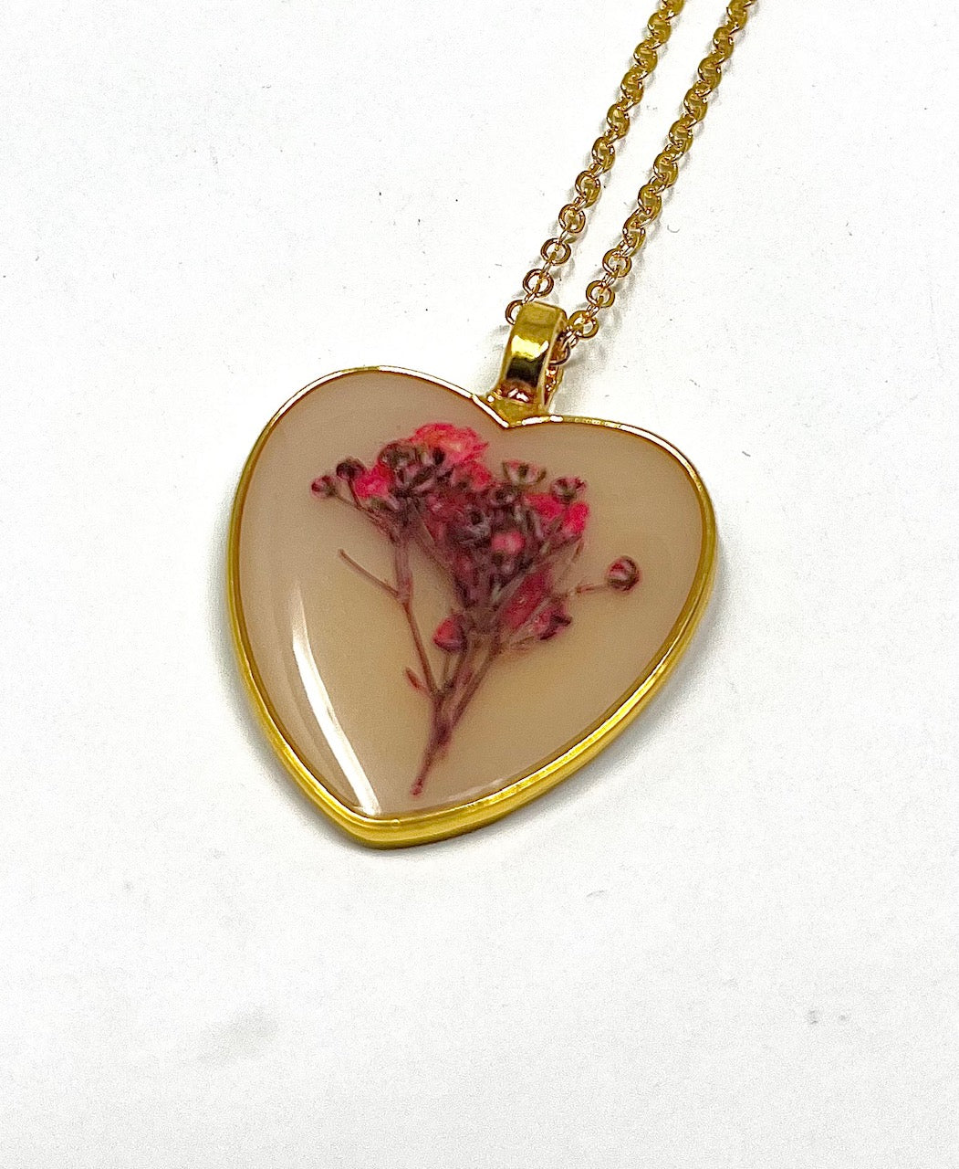 Heart Shaped Necklace with pressed tiny Pink flowers