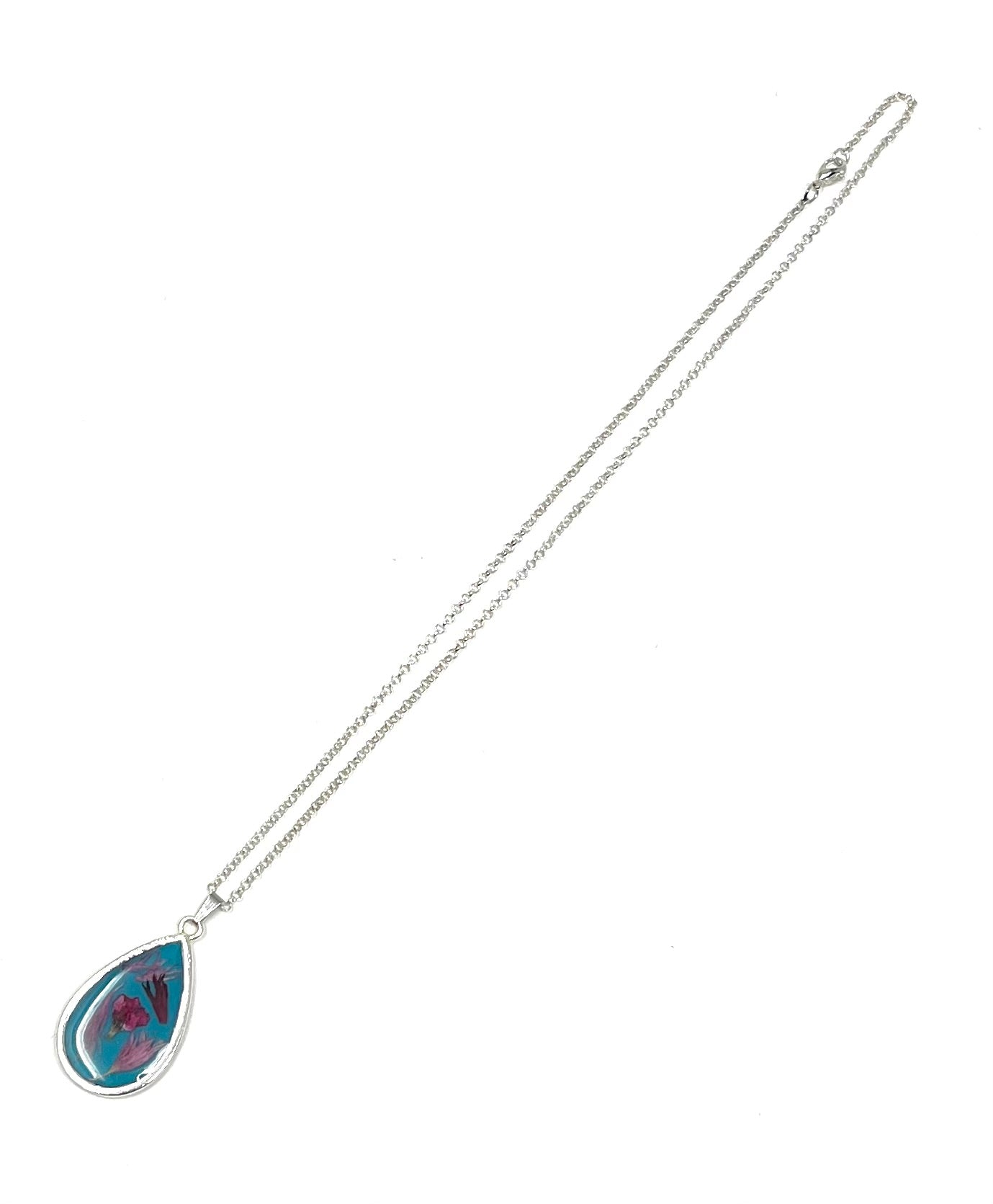 Teardrop Necklace with pressed Wild Flowers on a Blue Base